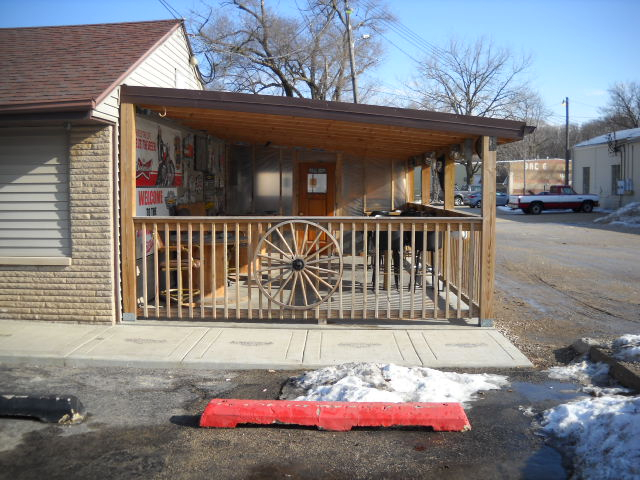 Brick fireplace with neon signs