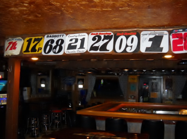 Flat track racing number plates above the bar