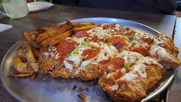 House made tenderloin sandwich with hand cut fries